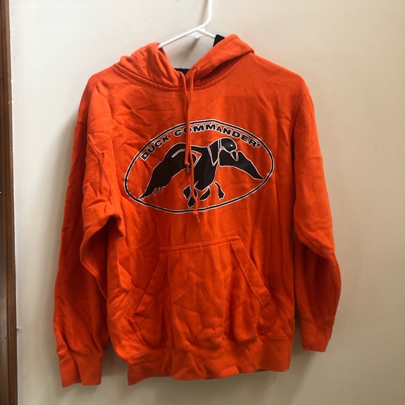 black hoodie with orange